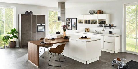 Кухня Nolte K&uuml;chen без ручок с островом и зоной для сиденья NOLTEKUECHENBEZRUCHOKSOSTROVOMIZONOYADLYASIDENIYA фото